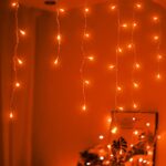 Qunlight LED Icicle Lights, 300 LEDs, 33ft, 8 Modes, Curtain Fairy Light with 50 Drops, Clear Wire LED String for Christmas/Thanksgiving/Easter/Halloween/Party Backdrops Decorations (Orange)