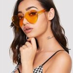 ADEWU Heart Shaped Rimless sunglasses Women, Cute Transparent Candy Colored Lens Orange Heart Glasses Festival Party Favor