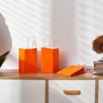 SUNCOLOR 12-Pack Orange Gift Bags with Handles – 8″ Recyclable Small Paper Goodie Bags for Party Favors, Easter, Halloween & Birthdays