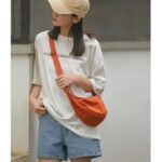 OHHMNKK Crossbody Hobo Crescent Bag, Candy Bag for Halloween Christmas, Women Lihgtweight Handbag with Mesh Storage, Shoulder Purse Adjustable Strap (Orange)