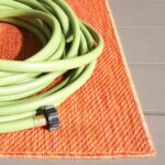 SAFAVIEH Washable Rug Outdoor Beach House Collection – 5’3″ x 7’6″, Orange, Non-Shedding & Easy to Clean, Ideal for Patio, Backyard, Mudroom (BHS274P)